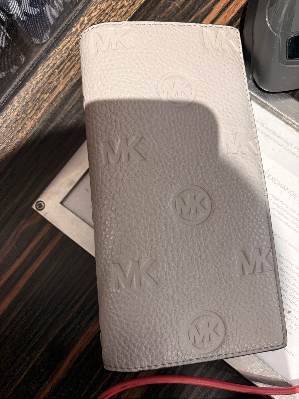Michael Kors cooper Embossed MK Pebbled Leather bi-fold slim wallet - Light Taup